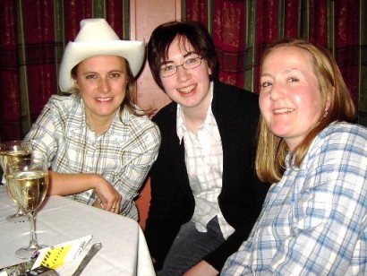 Picture of three members in their Wild West outfits