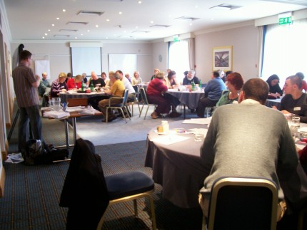 The guests listen attentively while to one of the talks.